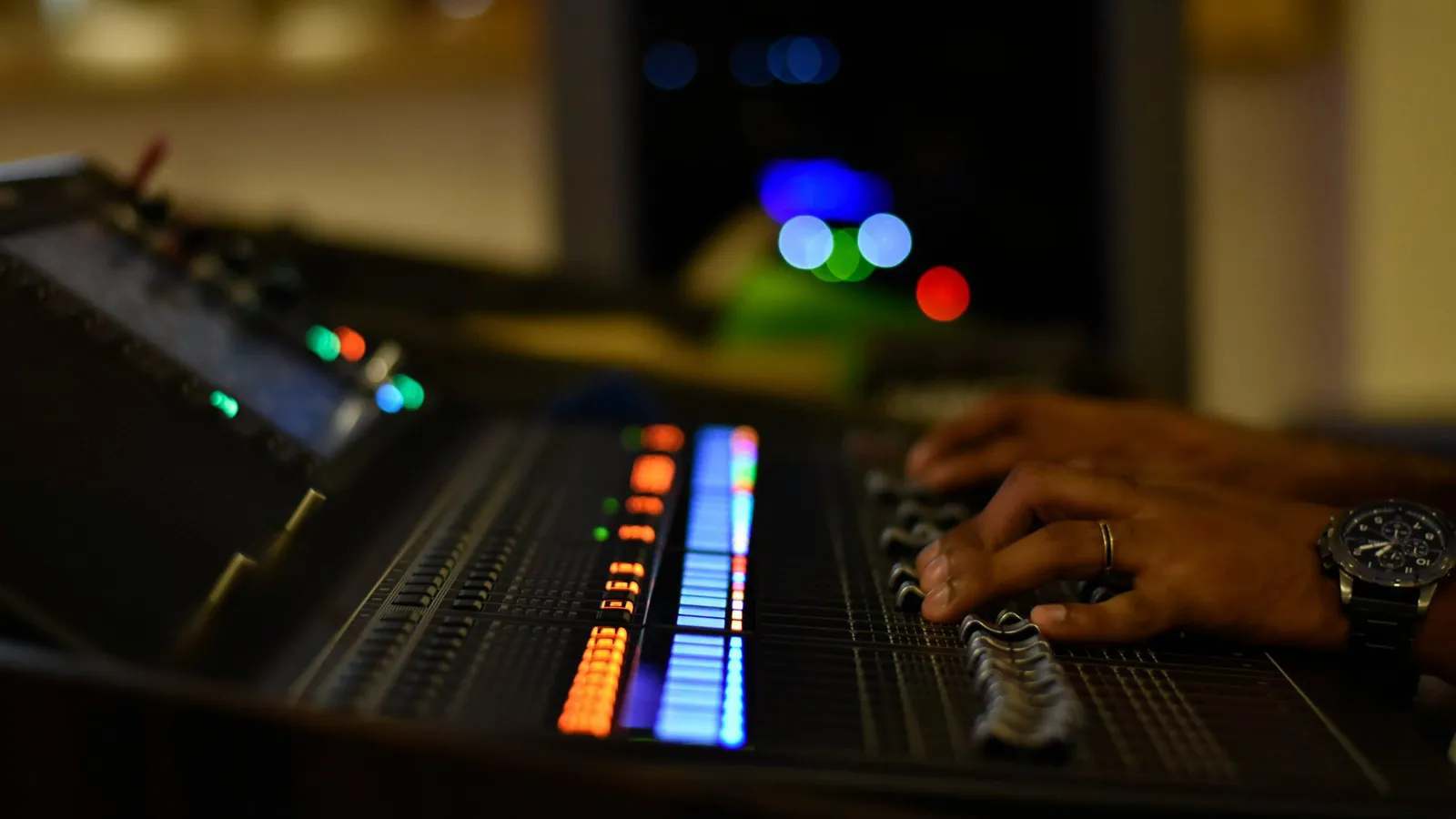 Illustrative image: a sound mixing console
